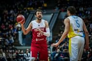 Turkey's Sertac Sanli (21) is one of the leads the offense in the floor for the 2-0 Turkish squad.